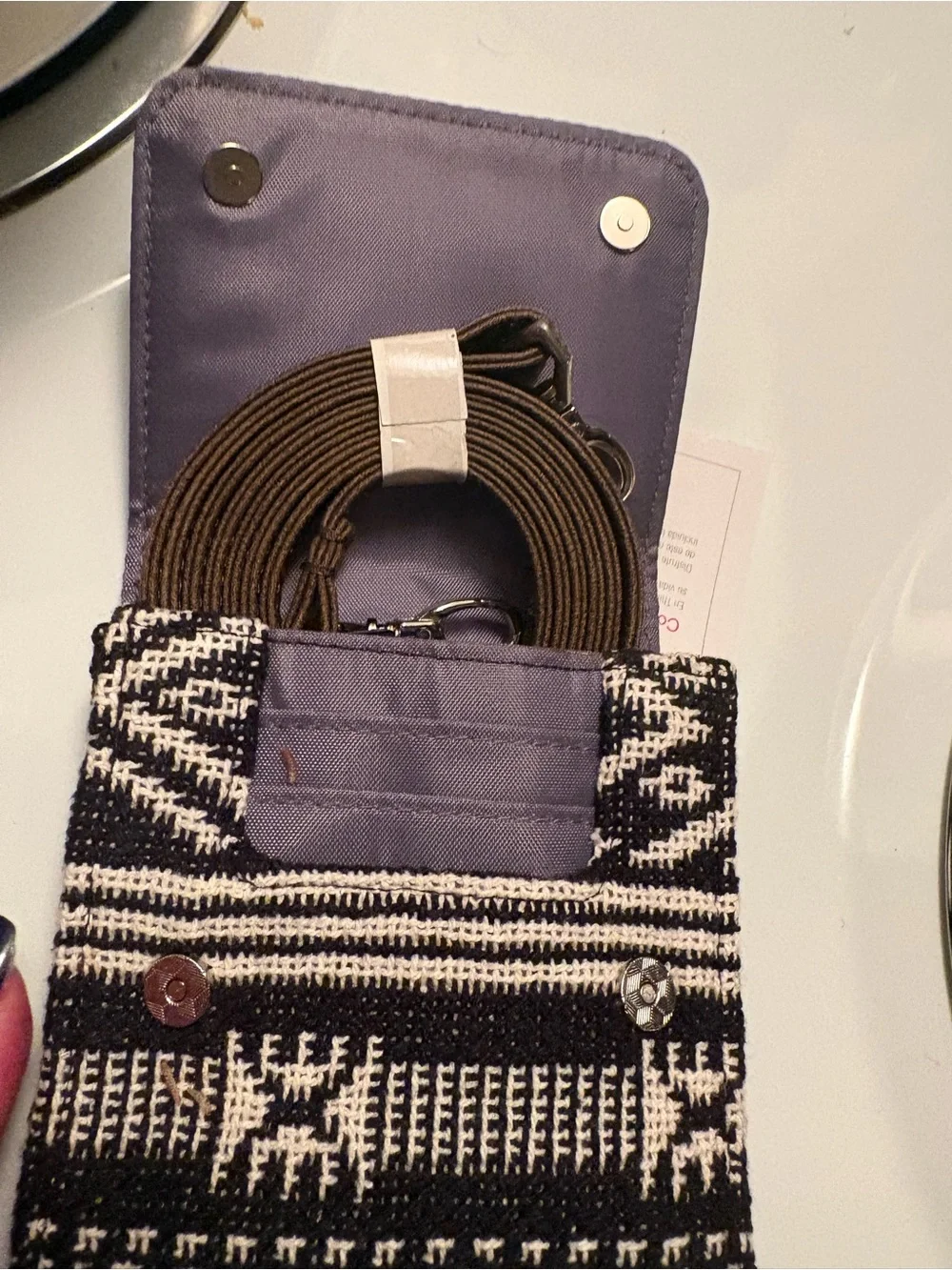 Wallet bag, NWT, snap closure and includes long strap.